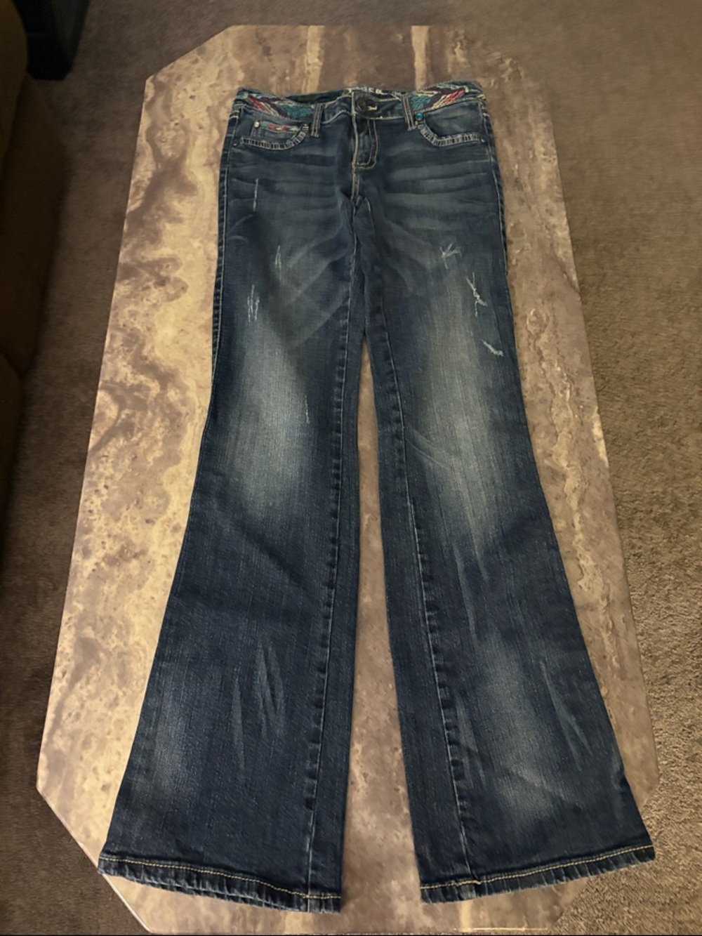 Dark Blue Flare Jeans with Subtle Distressing